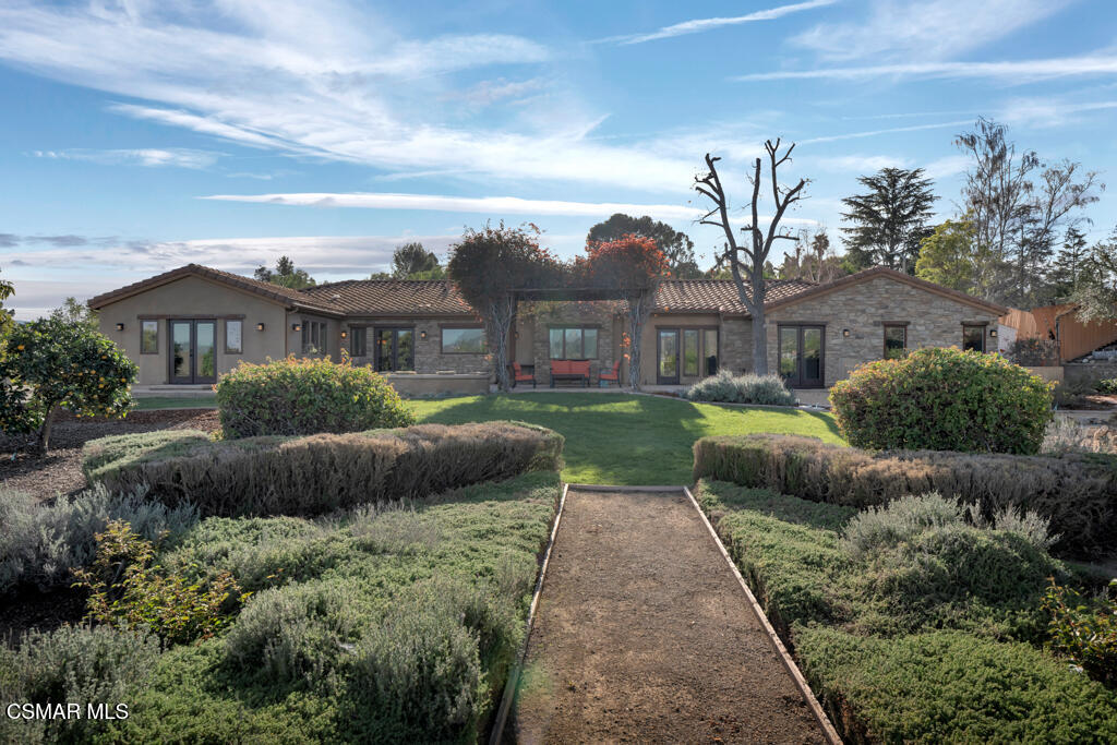 1660 San Rafael Way Camarillo, CA 93012 - Photo 48 of 63 a view of a house with a yard and potted plants