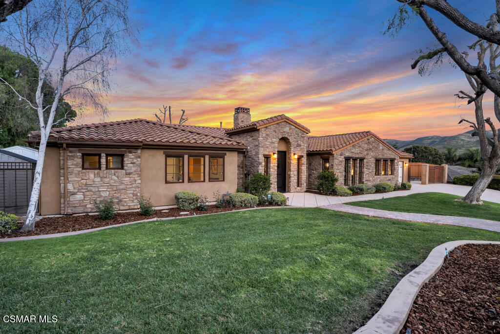 1660 San Rafael Way Camarillo, CA 93012 - Photo 54 of 63 a front view of a house with a garden