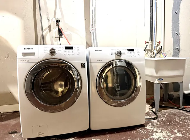 a utility room with dryer and washer