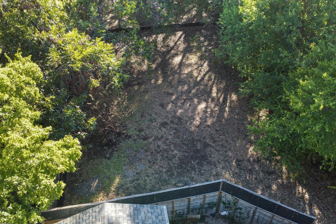 935 East 56th Street, Unit 2 & 3 Austin, TX 78751 - Photo 14 of 19 a side view of a house with a tree