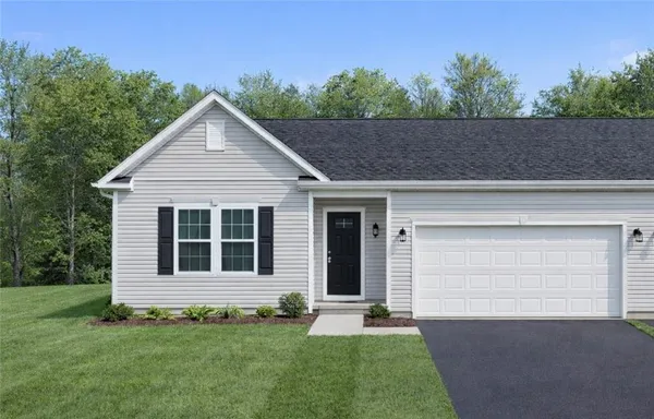 a view of front of house with a yard