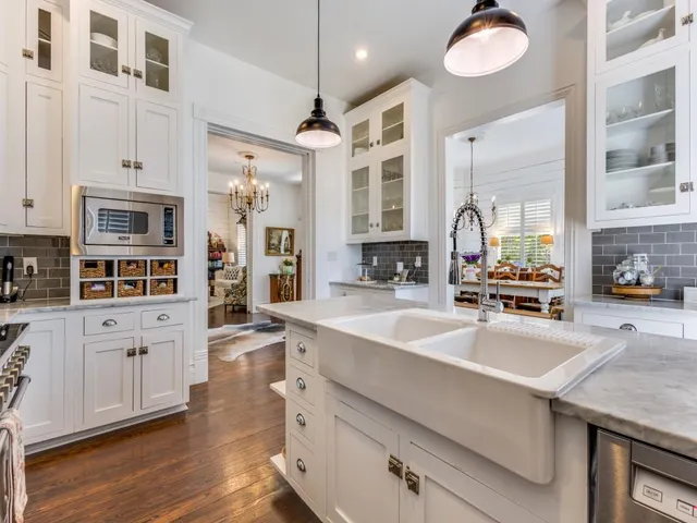 a view of a workspace with furniture and wooden floor