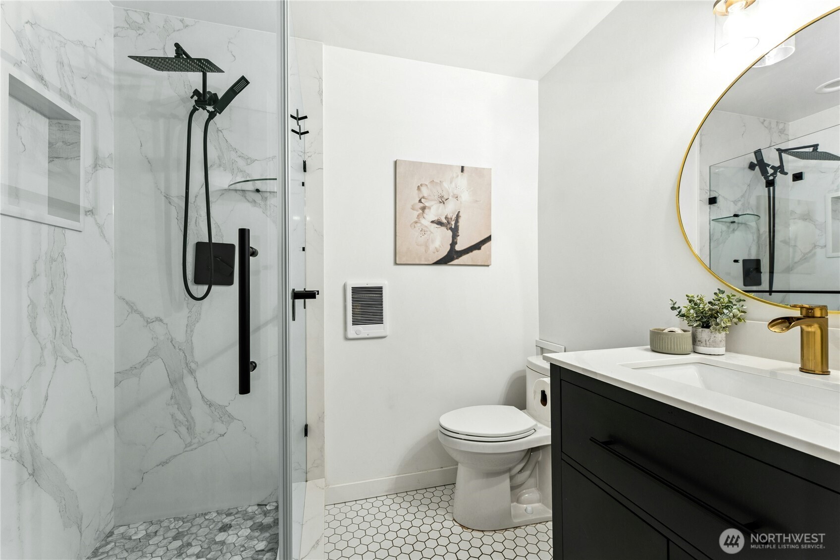 18152 145th Avenue Southeast Renton, WA 98058 - Photo 24 of 40 a bathroom with a sink toilet and shower