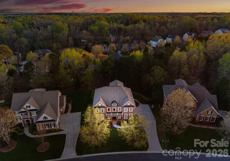 an aerial view of a house with a garden