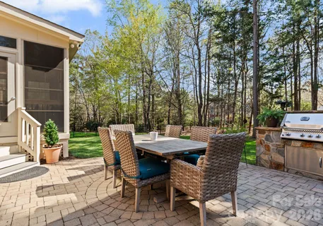 a view of a patio with a yard