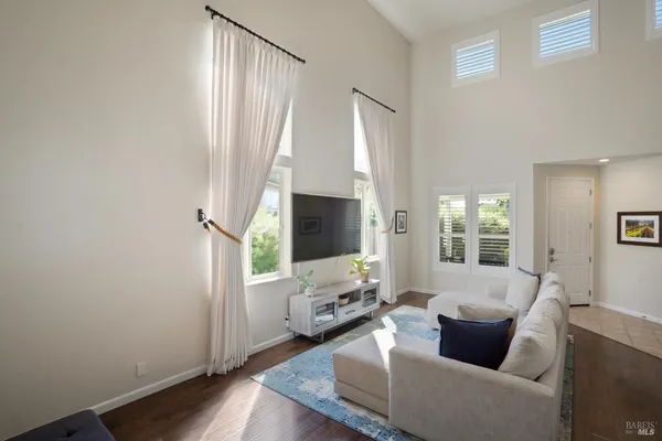 a bedroom with a bed and a lamp