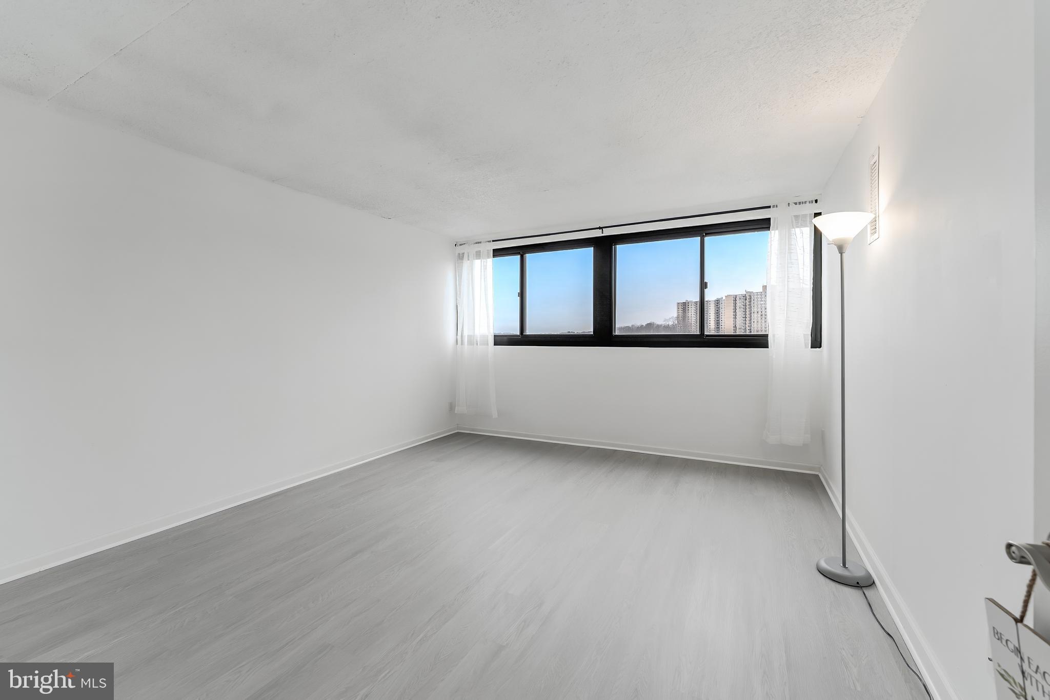 5911 Edsall Road, Unit 708 Alexandria, VA 22304 - Photo 16 of 39 an empty room with a window