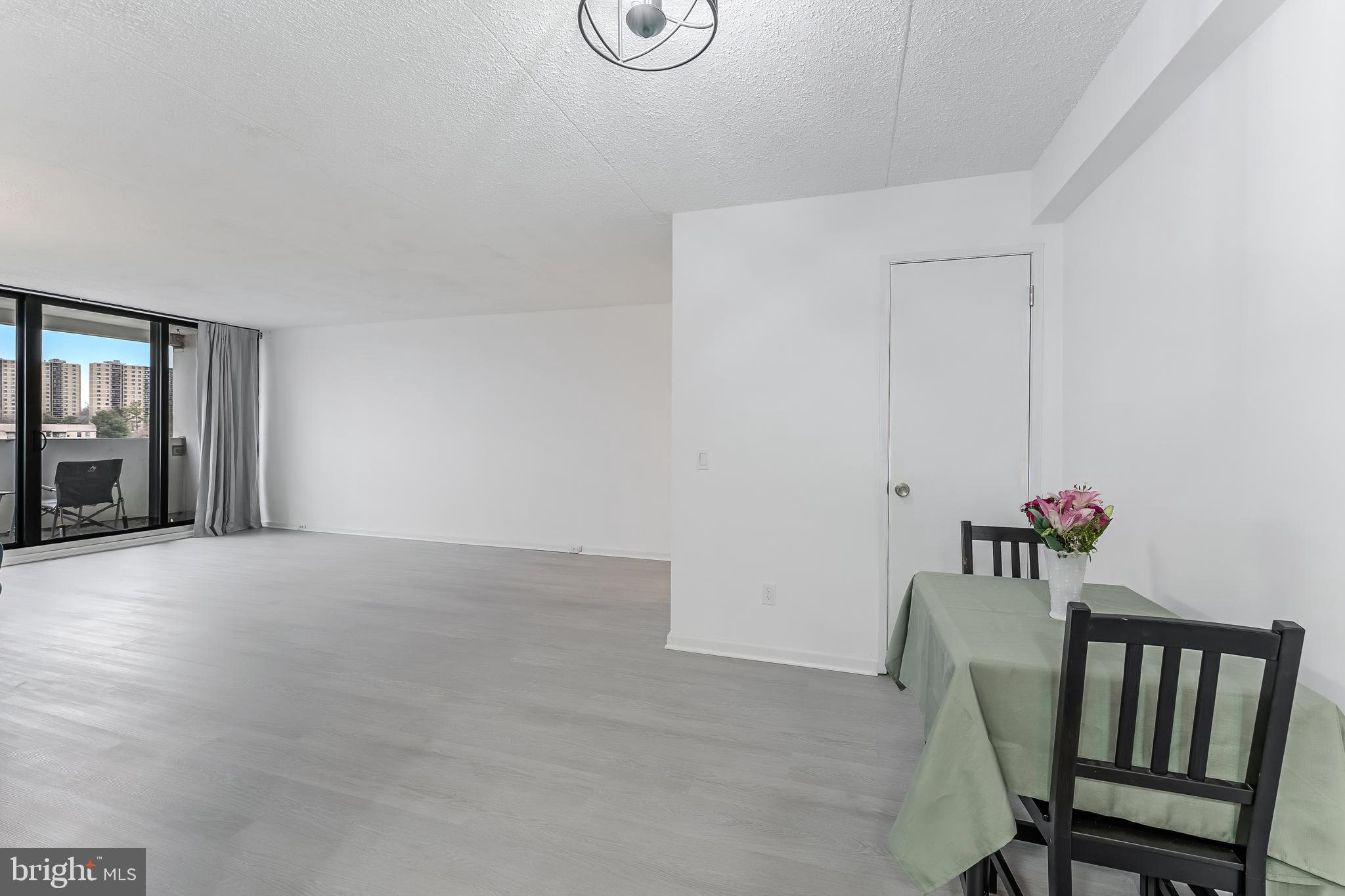 5911 Edsall Road, Unit 708 Alexandria, VA 22304 - Photo 9 of 39 a workspace with furniture and window