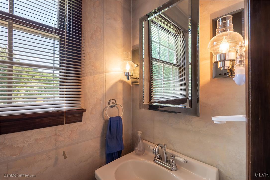 725 Remaley Road Bath, PA 18014 - Photo 18 of 39 Powder Room 1st flr, easy exit to the pool, no run