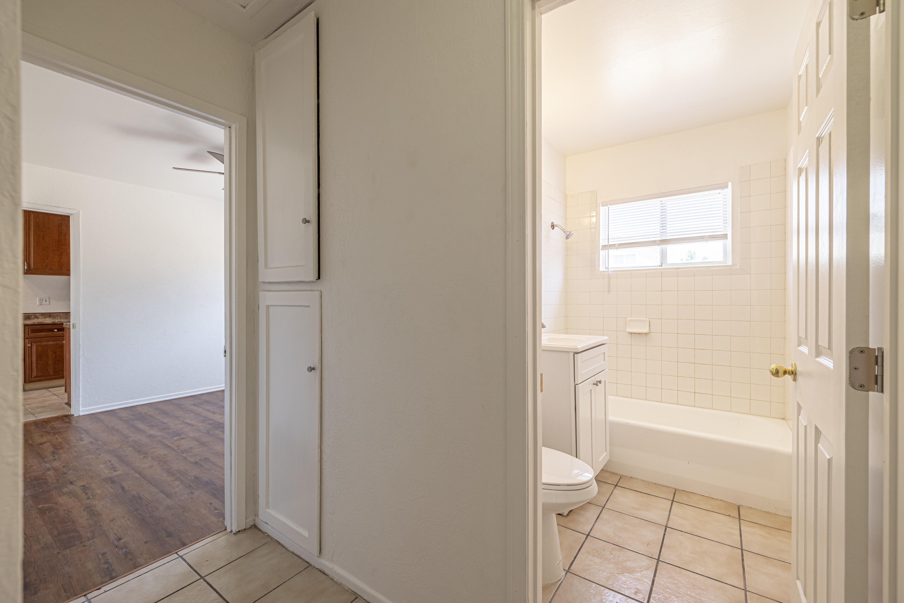 44272 Glenraven Road Lancaster, CA 93535 - Photo 14 of 21 a bathroom with a bathtub and a shower