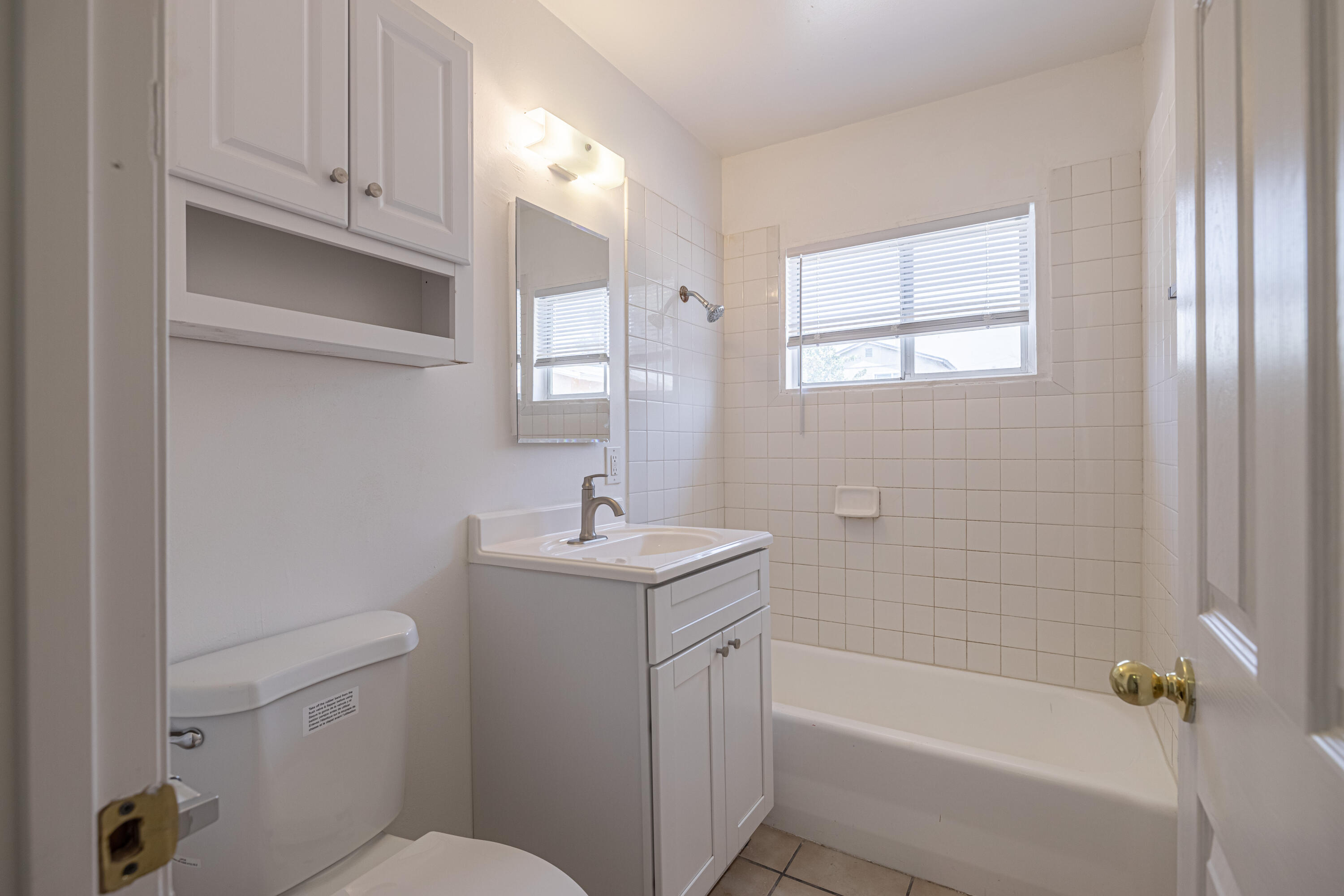 44272 Glenraven Road Lancaster, CA 93535 - Photo 17 of 21 a bathroom with a sink a toilet and shower