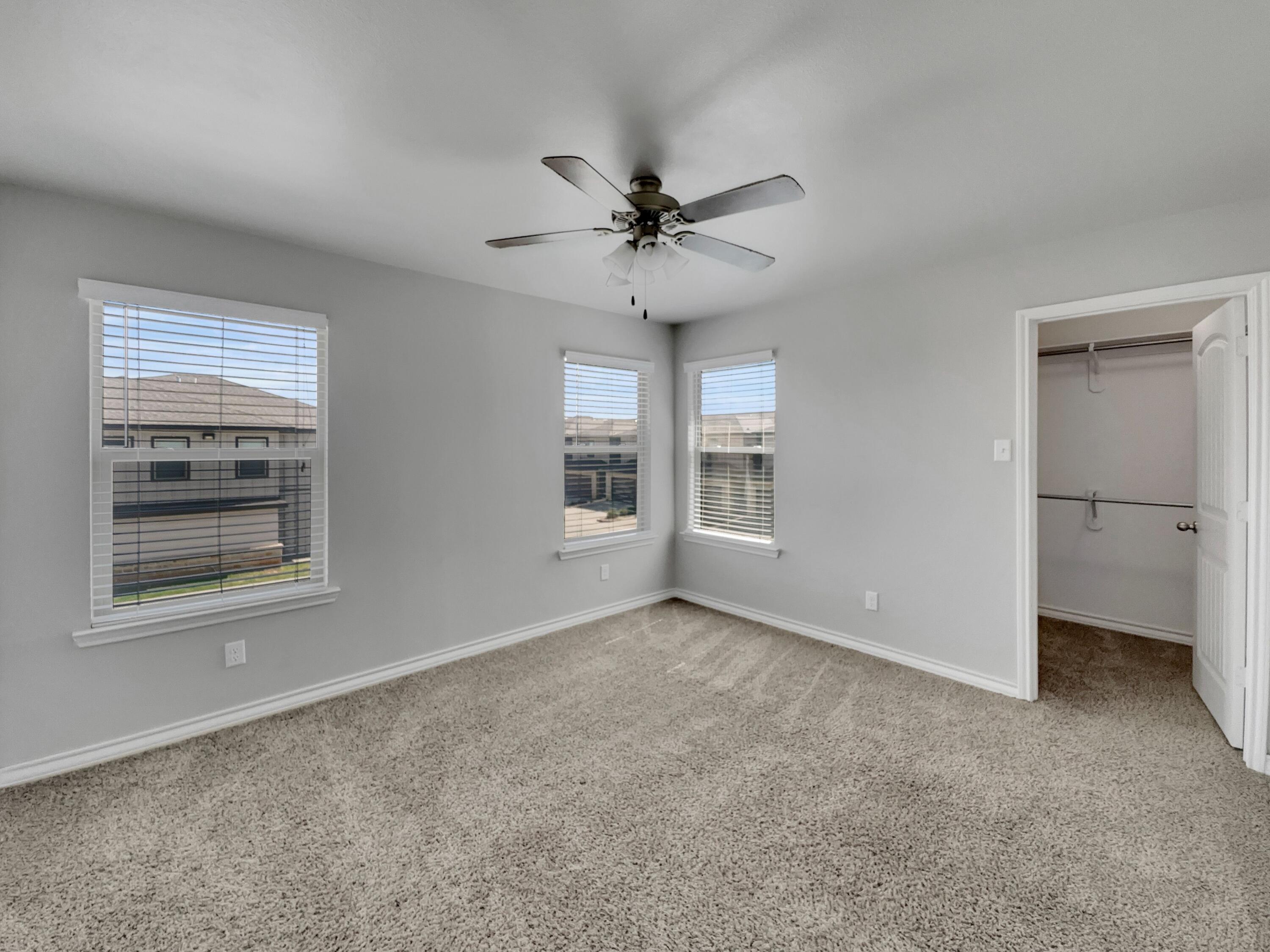 6040 24th Street, Unit 41 Lubbock, TX 79407 - Photo 10 of 12 a view of an empty room with a window