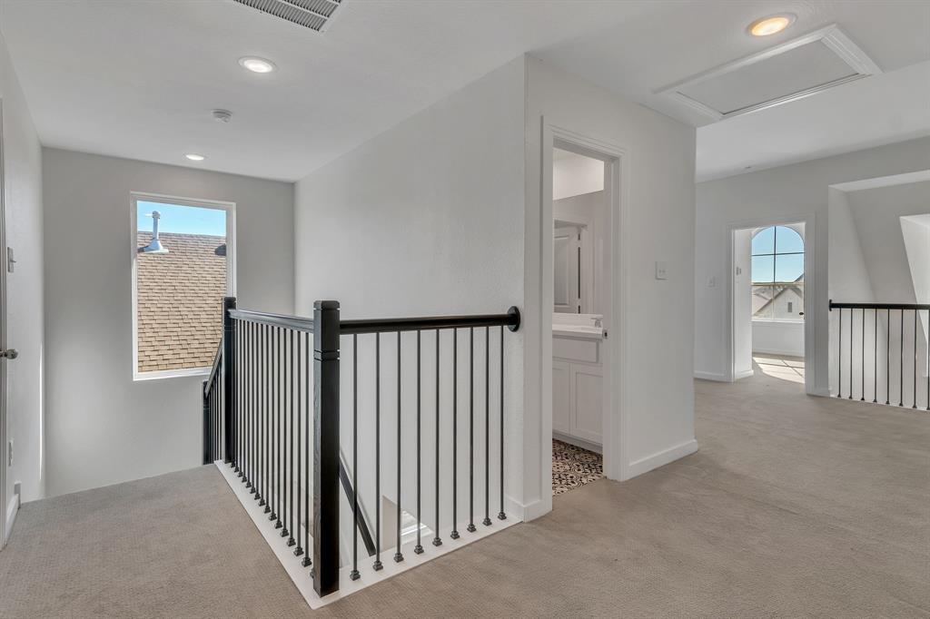 14924 Nightmist Road Aledo, TX 76008 - Photo 23 of 29 a view of a hallway with entryway to rooms