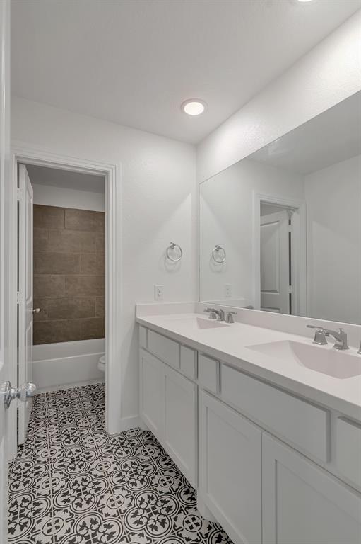 14924 Nightmist Road Aledo, TX 76008 - Photo 24 of 29 a spacious bathroom with a sink and a mirror