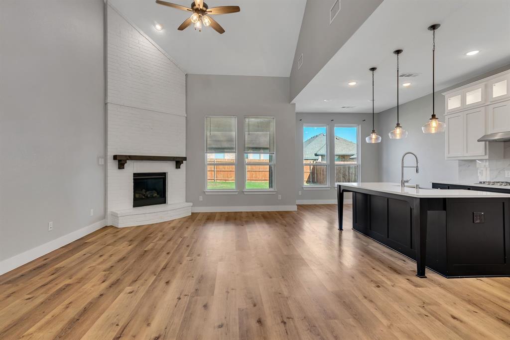 14924 Nightmist Road Aledo, TX 76008 - Photo 7 of 29 a view of an empty room window and wooden floor