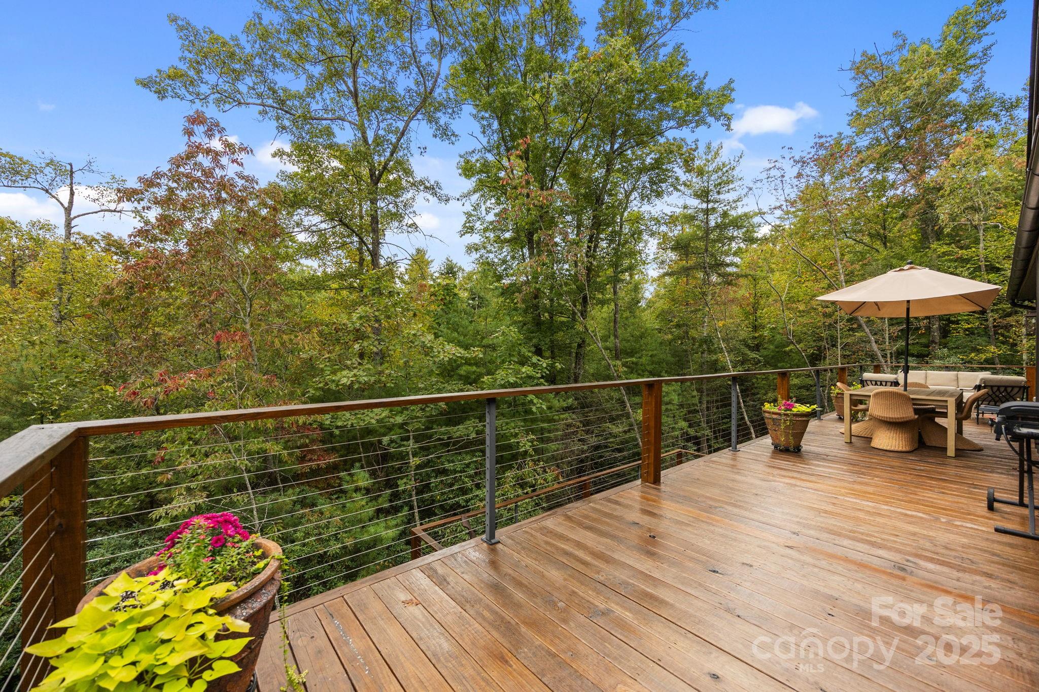 91 Boone Cove Road Zirconia, NC 28790 - Photo 17 of 48 a view of outdoor space with seating space