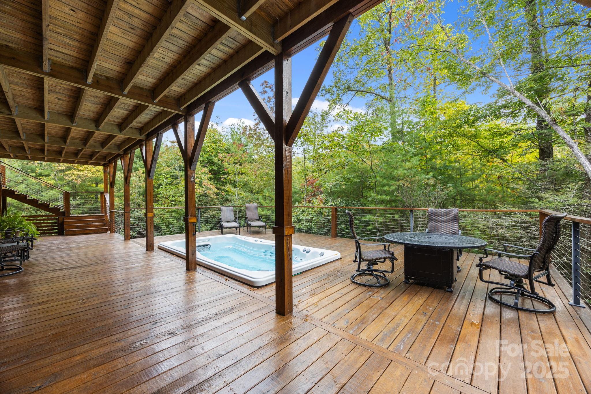 91 Boone Cove Road Zirconia, NC 28790 - Photo 37 of 48 a view of porch with seating space