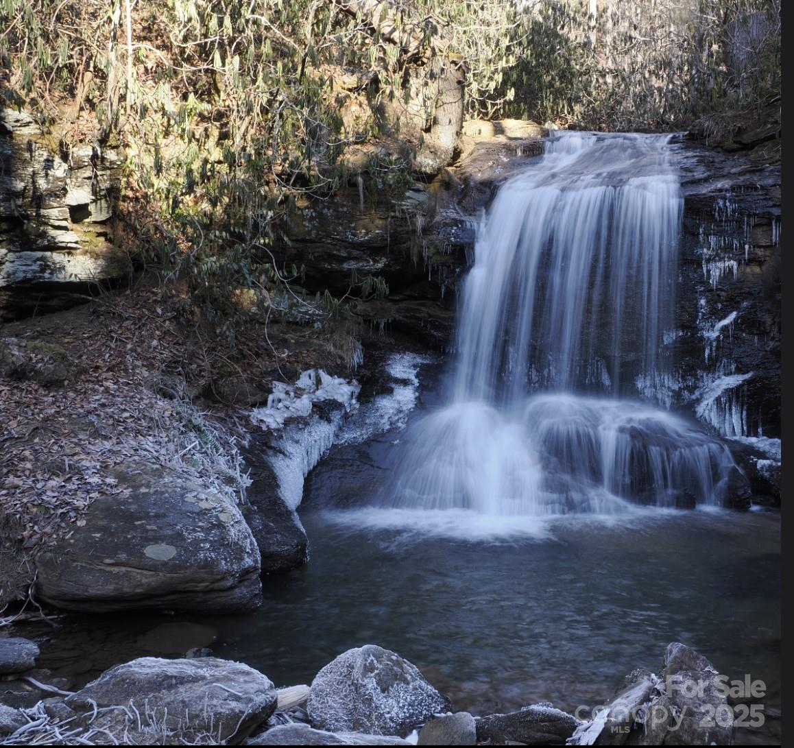 91 Boone Cove Road Zirconia, NC 28790 - Photo 45 of 48 a view of barbeque area with water