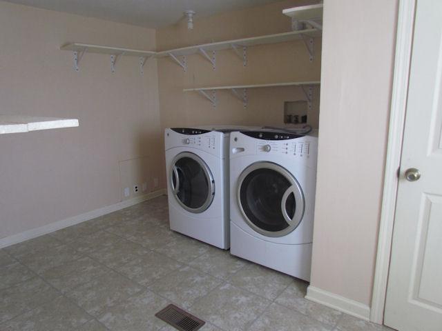388 Shorter Road Lebanon, TN 37090 - Photo 7 of 20 The large utility room has plenty of shelves.