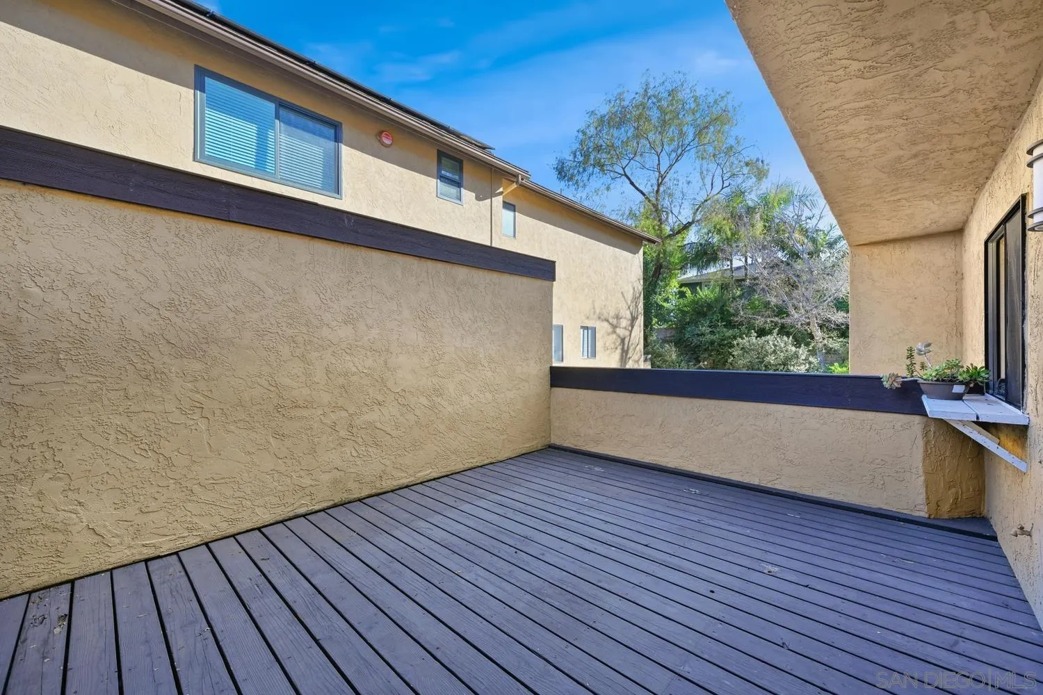 1680 North Coast Highway 101, Unit 30 Encinitas, CA 92024 - Photo 11 of 41 a view of balcony with wooden floor