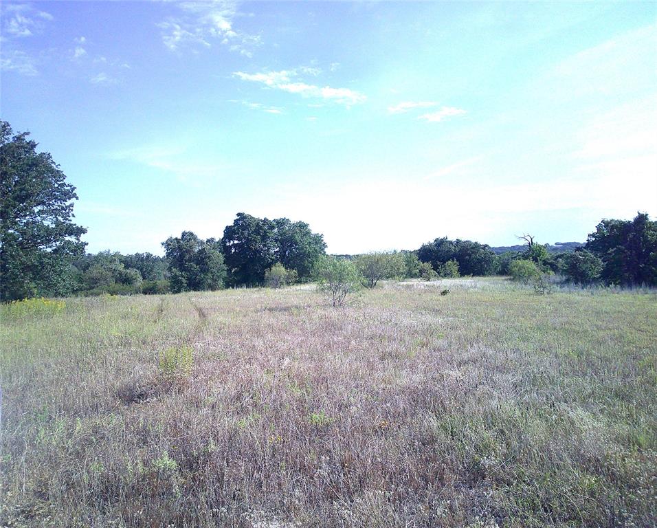 3757 Springtown Tx 76082 Springtown, TX 76082 - Photo 2 of 10 a view of an outdoor space and a yard