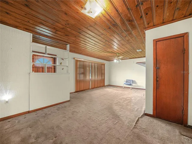 a view of a hallway with closet