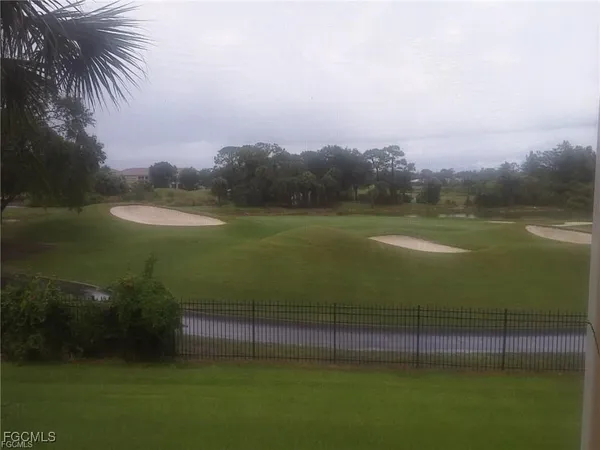 a view of a lake from a yard