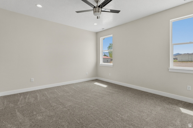 169 West 100 South Joseph, UT 84739 - Photo 13 of 35 Carpeted spare room featuring recessed lighting and a ceiling fan
