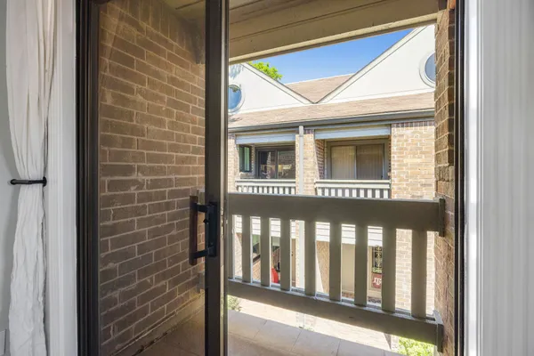 a view of a balcony from a door