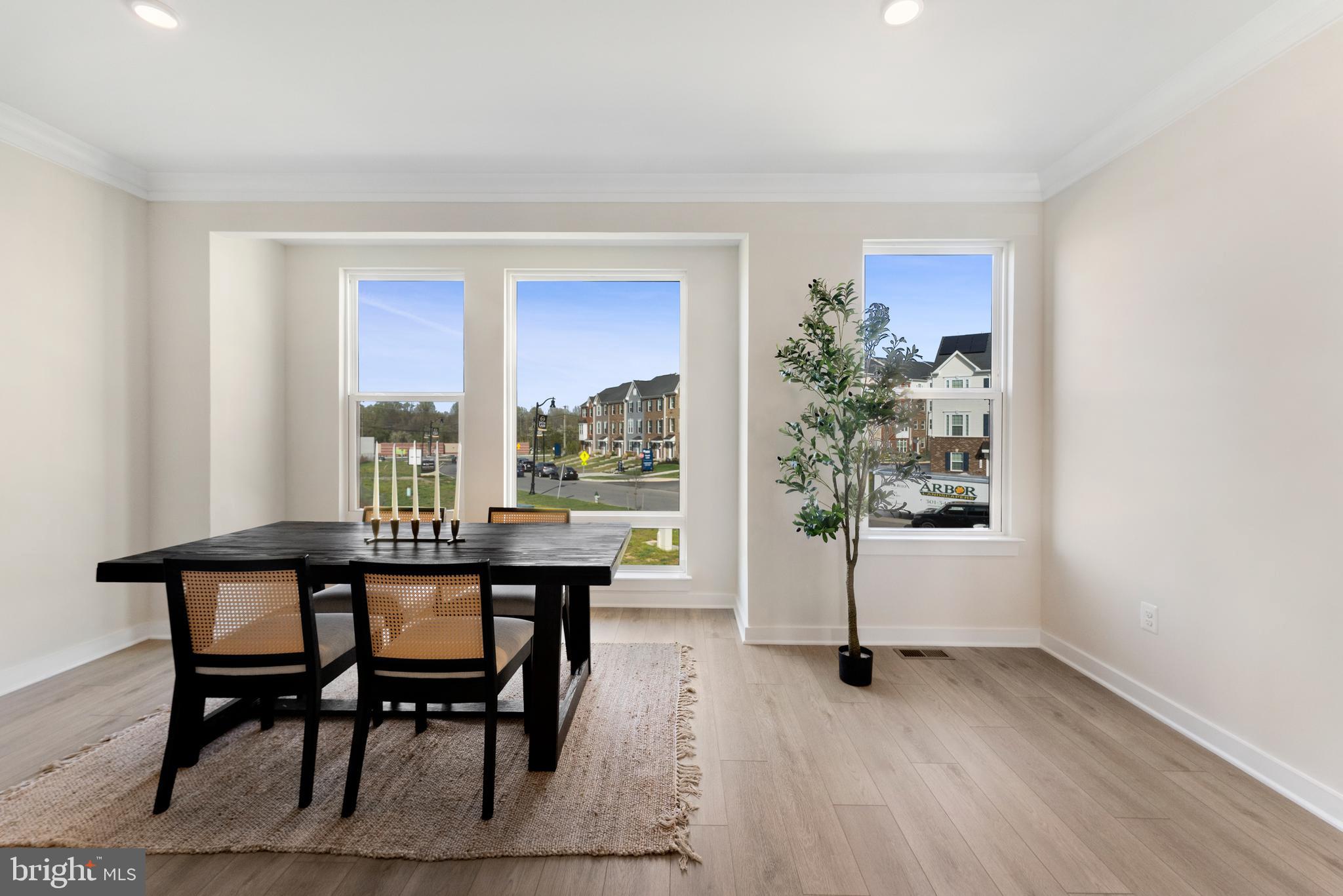 129 Summit Point Boulevard, Unit 11J Bowie, MD 20716 - Photo 26 of 45 a view of a livingroom with furniture window and wooden floor