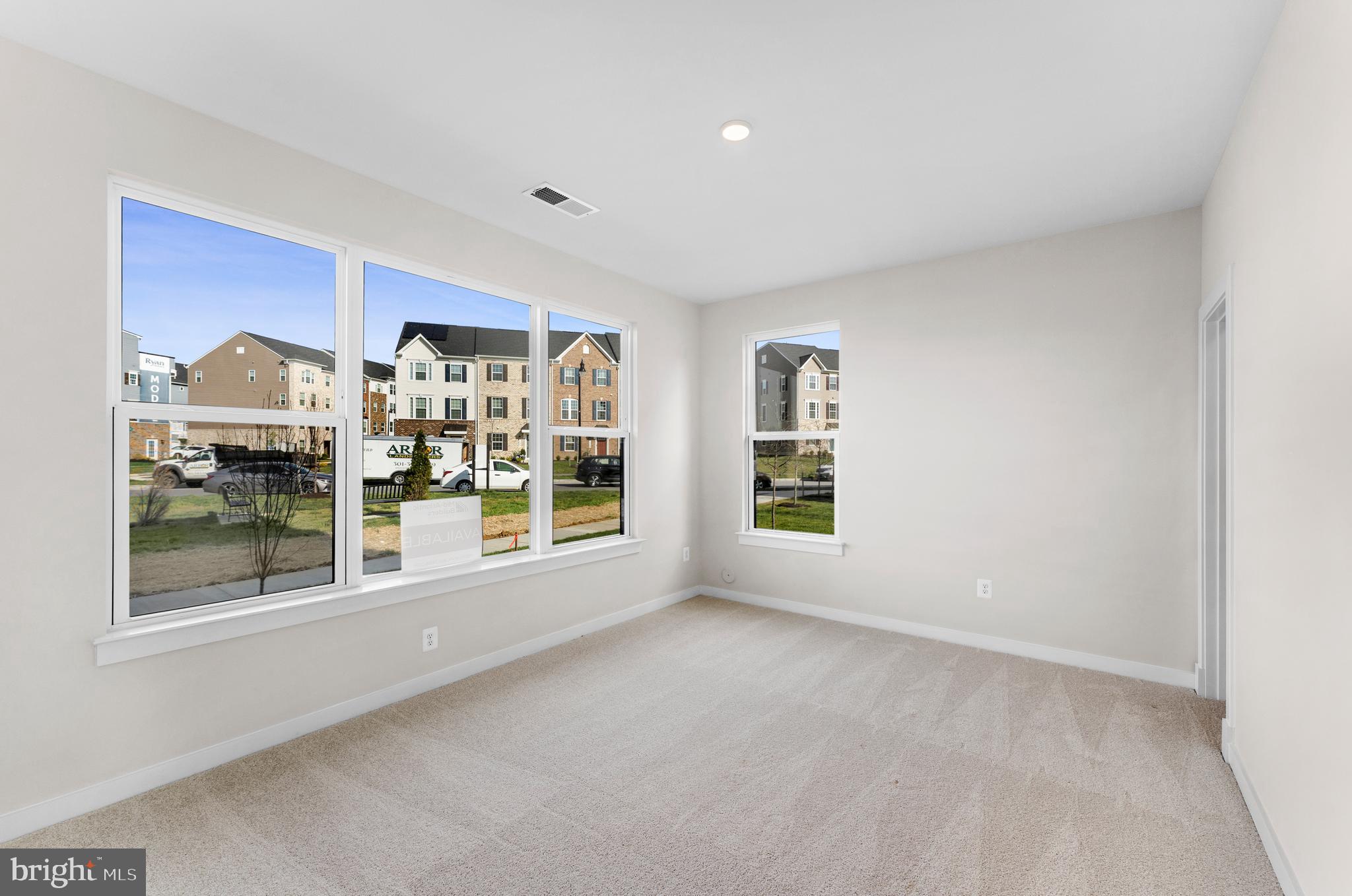 129 Summit Point Boulevard, Unit 11J Bowie, MD 20716 - Photo 36 of 45 a view of an empty room with a window