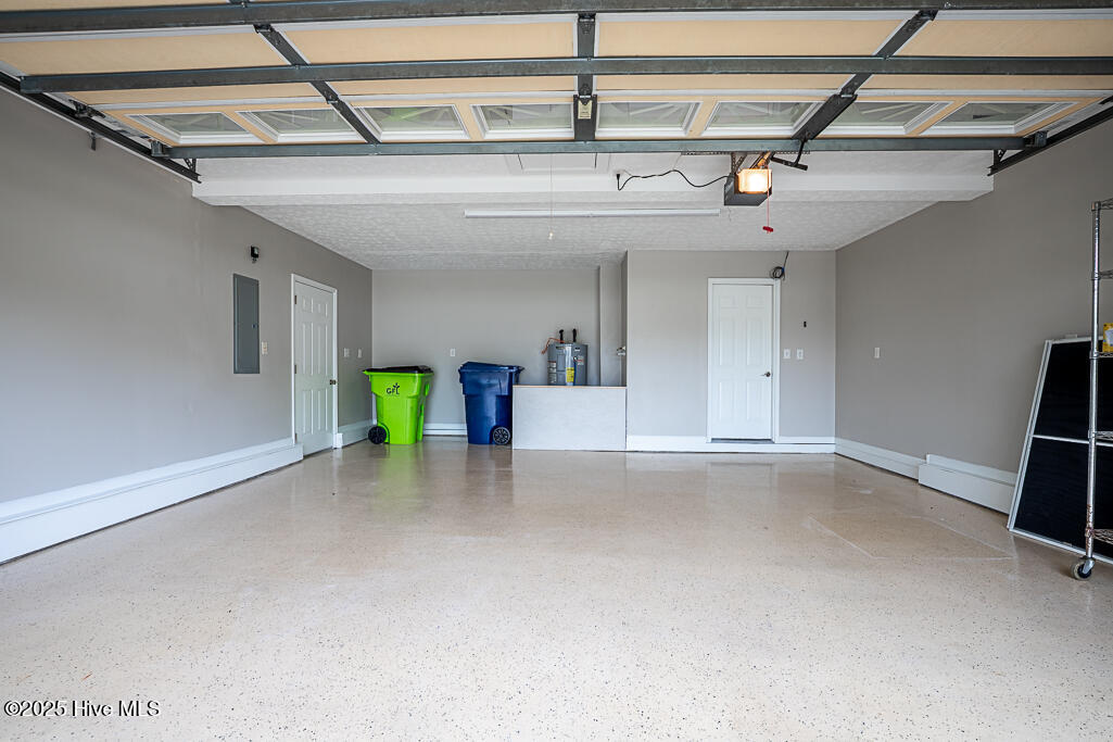 604 Fox Ridge Court Havelock, NC 28532 - Photo 21 of 24 Garage Has Sealed Floor and Personnel Door