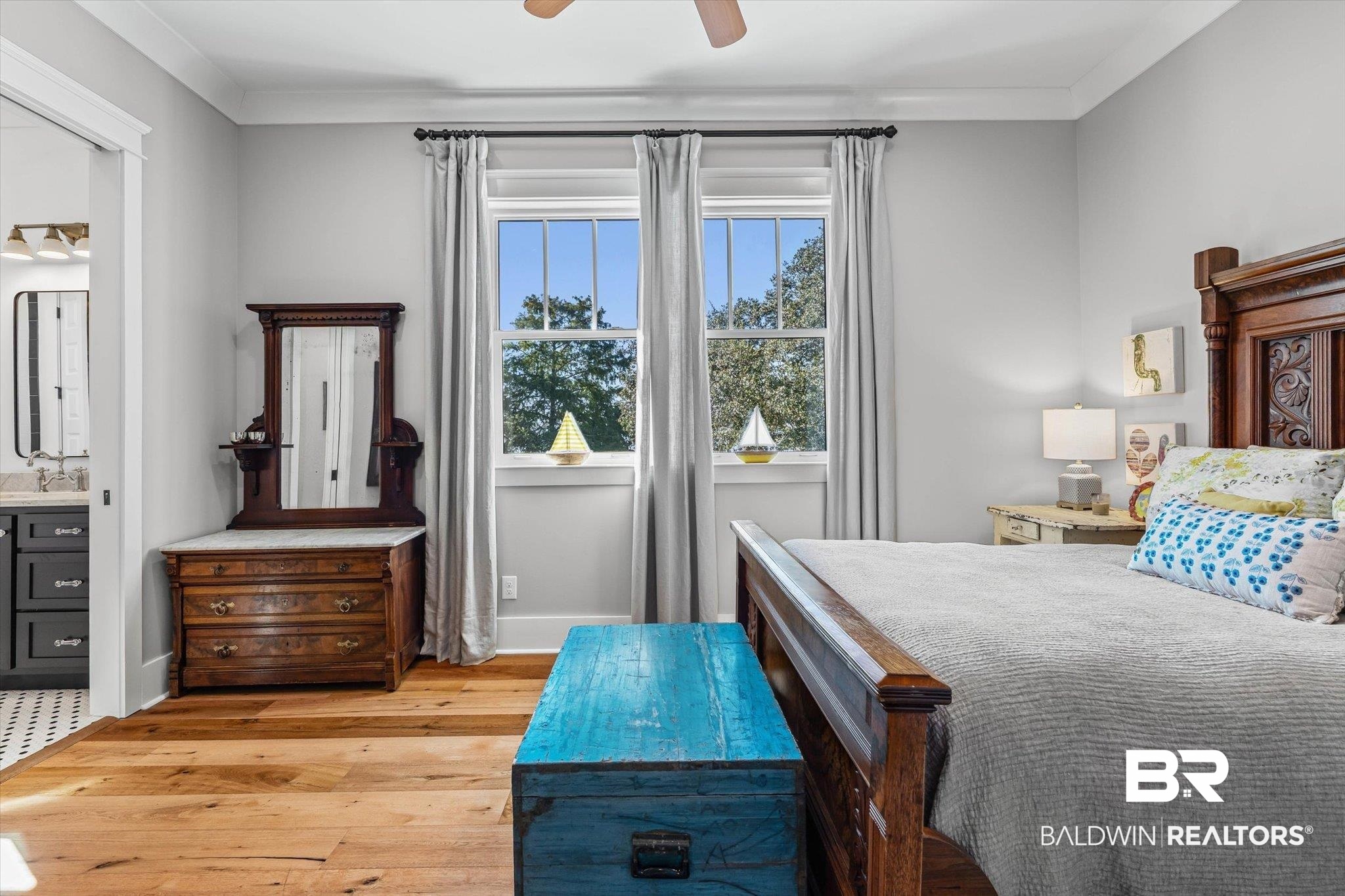 2415 Venetia Road Mobile, AL 36605 - Photo 28 of 50 Bedroom featuring ornamental molding, light wood finished floors, ceiling fan, and ensuite bath