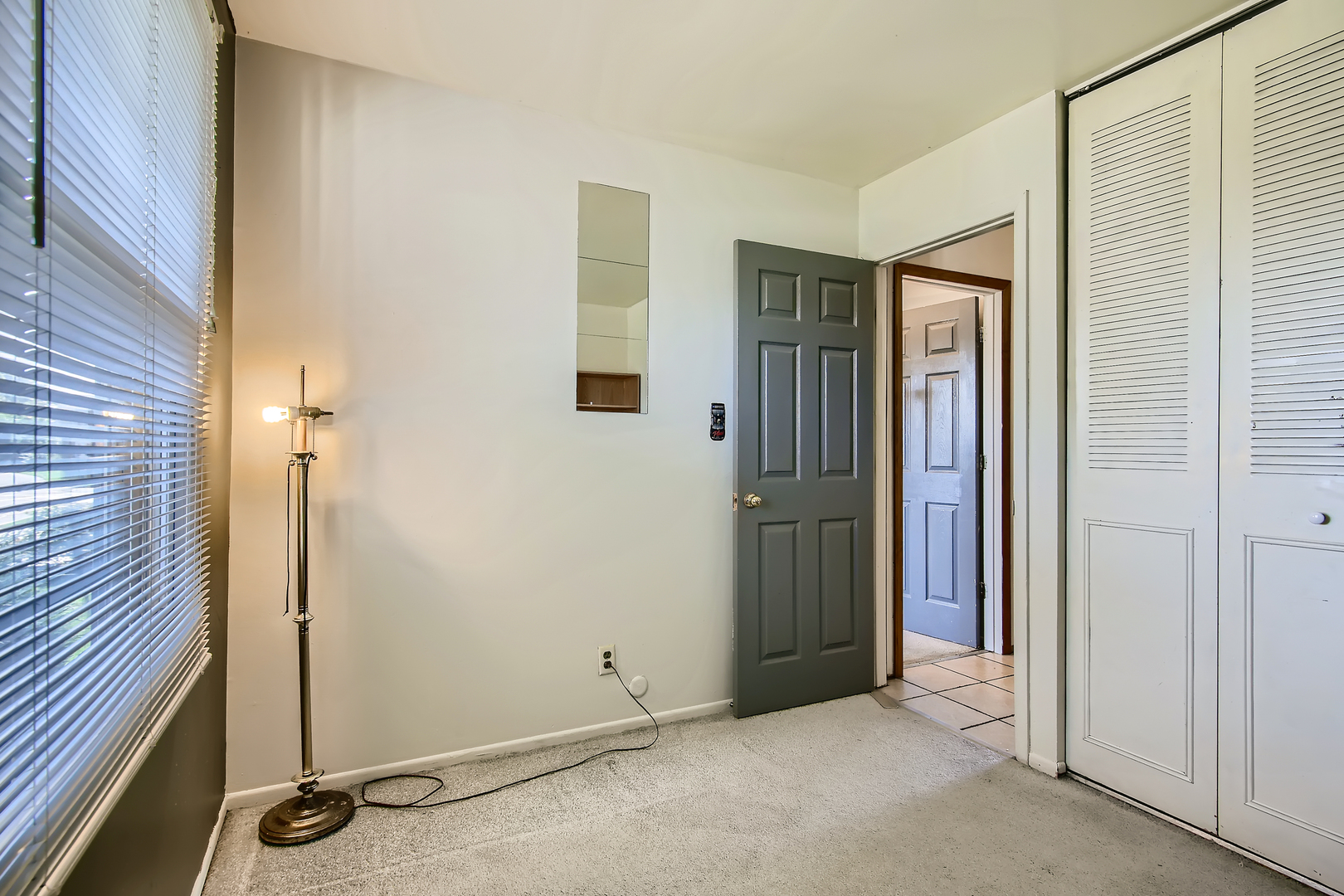 704 Evergreen Court Romeoville, IL 60446 - Photo 14 of 15 an empty room with windows