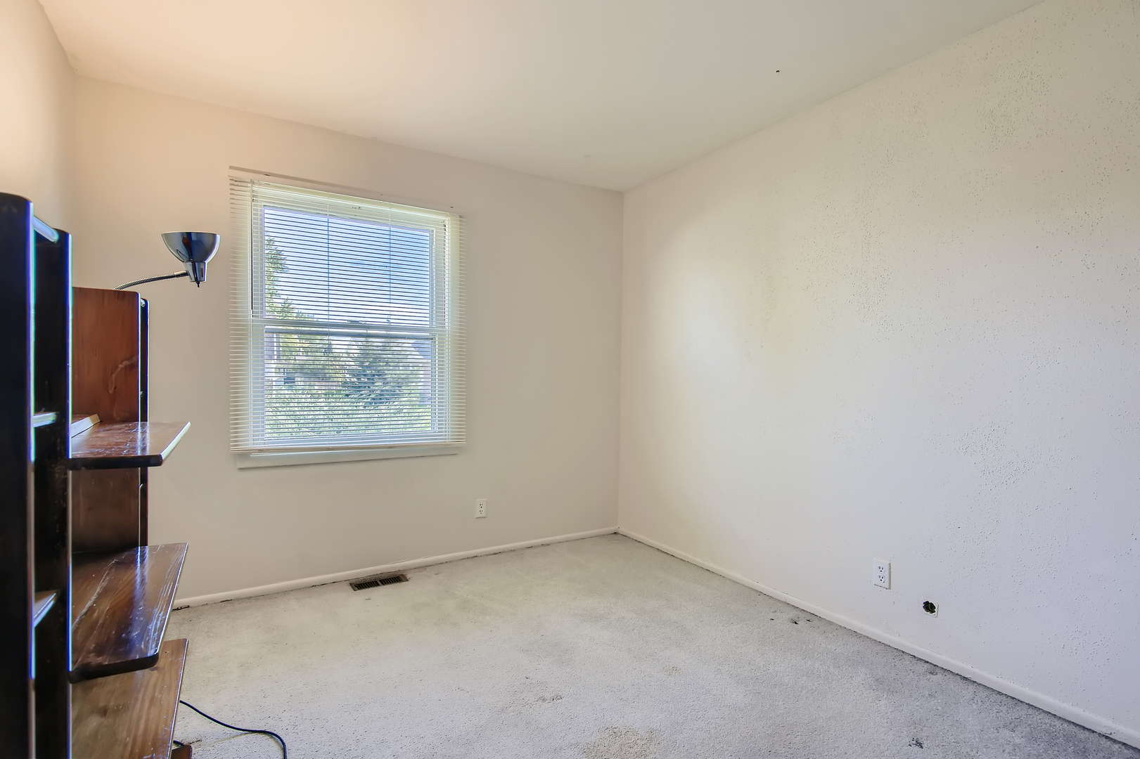 704 Evergreen Court Romeoville, IL 60446 - Photo 15 of 15 an empty room with windows
