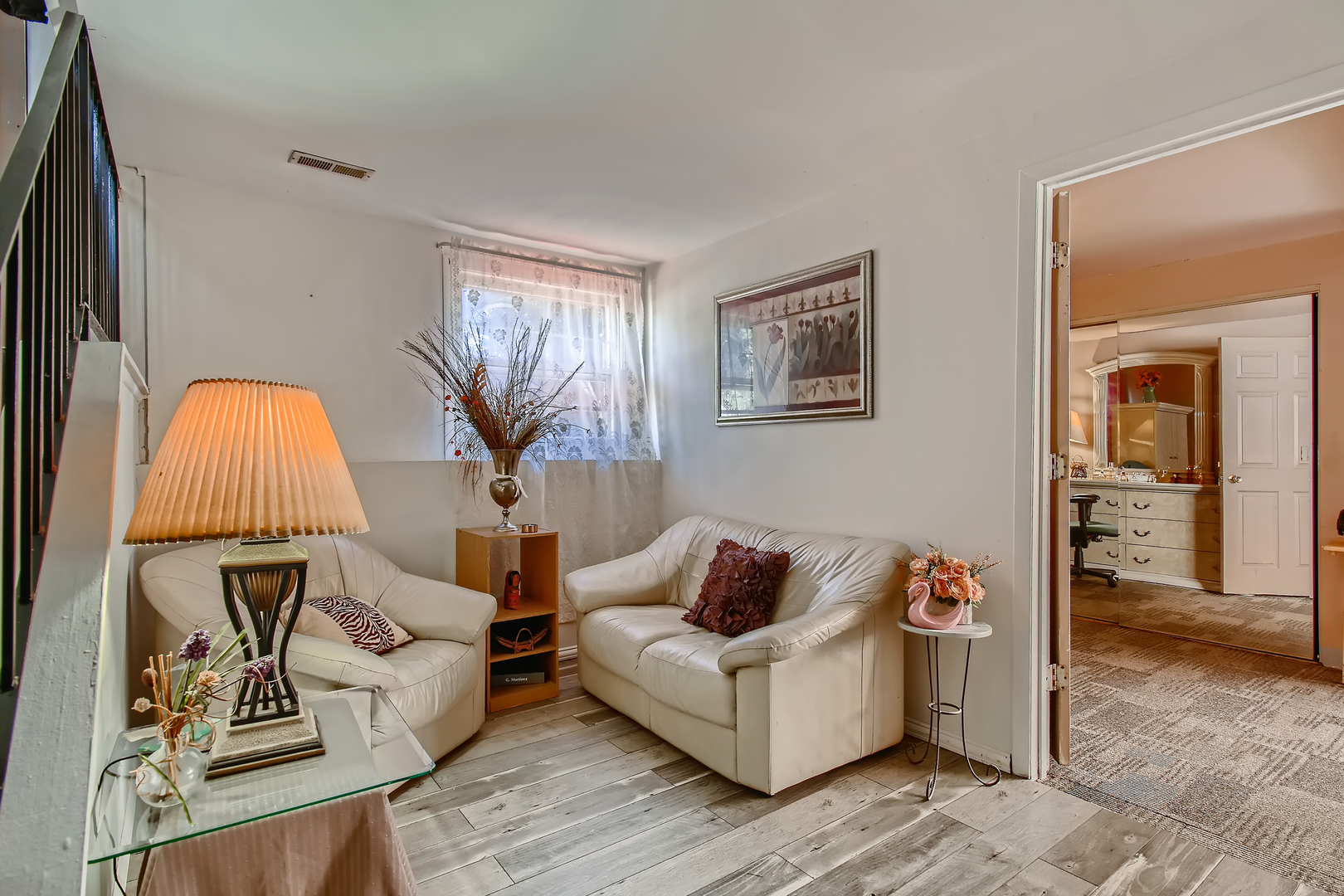 704 Evergreen Court Romeoville, IL 60446 - Photo 7 of 15 a living room with furniture and a window