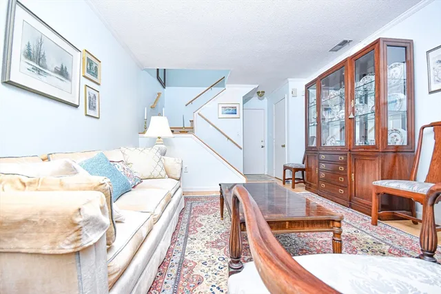 a view of a living room and workspace