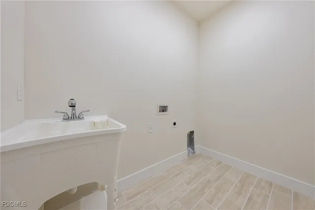 $285,000 | 2705 56th Street West, Lehigh Acres, FL 33971