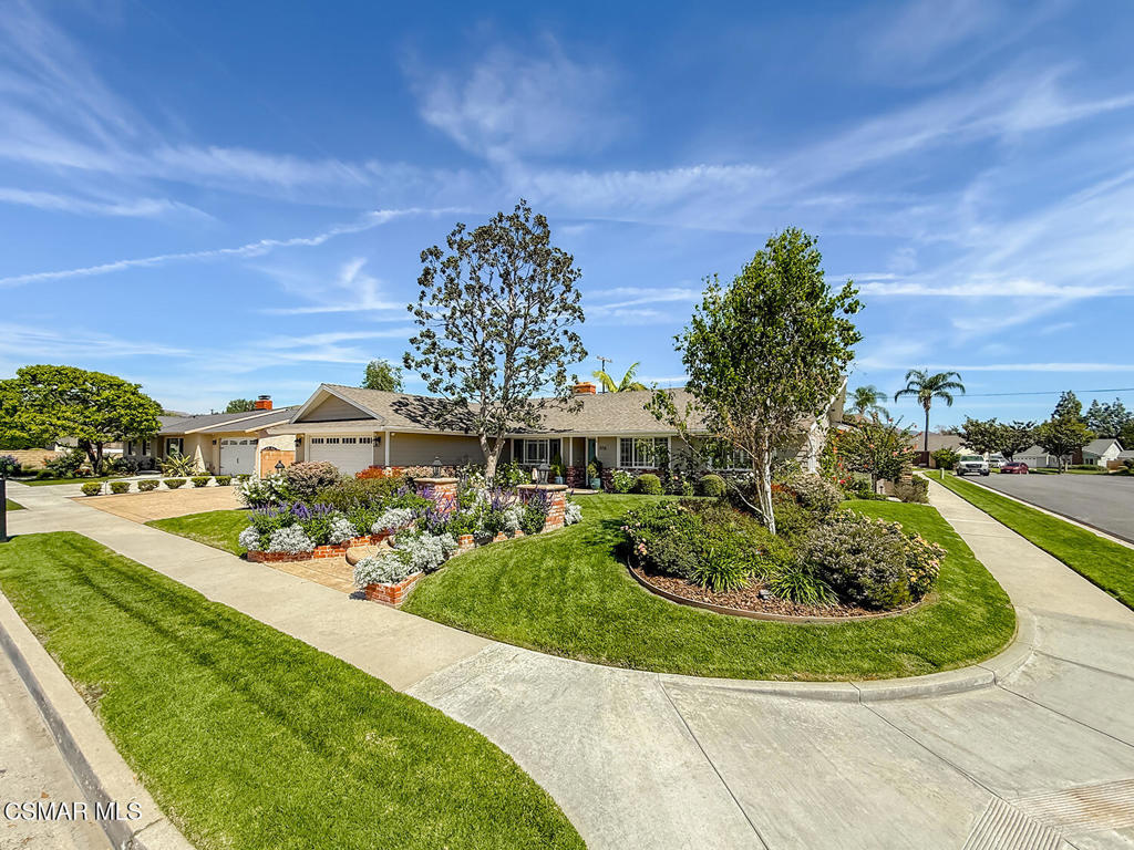 3116 Lori Circle Simi Valley, CA 93063 - Photo 2 of 74 a view of a house with a yard and potted plants