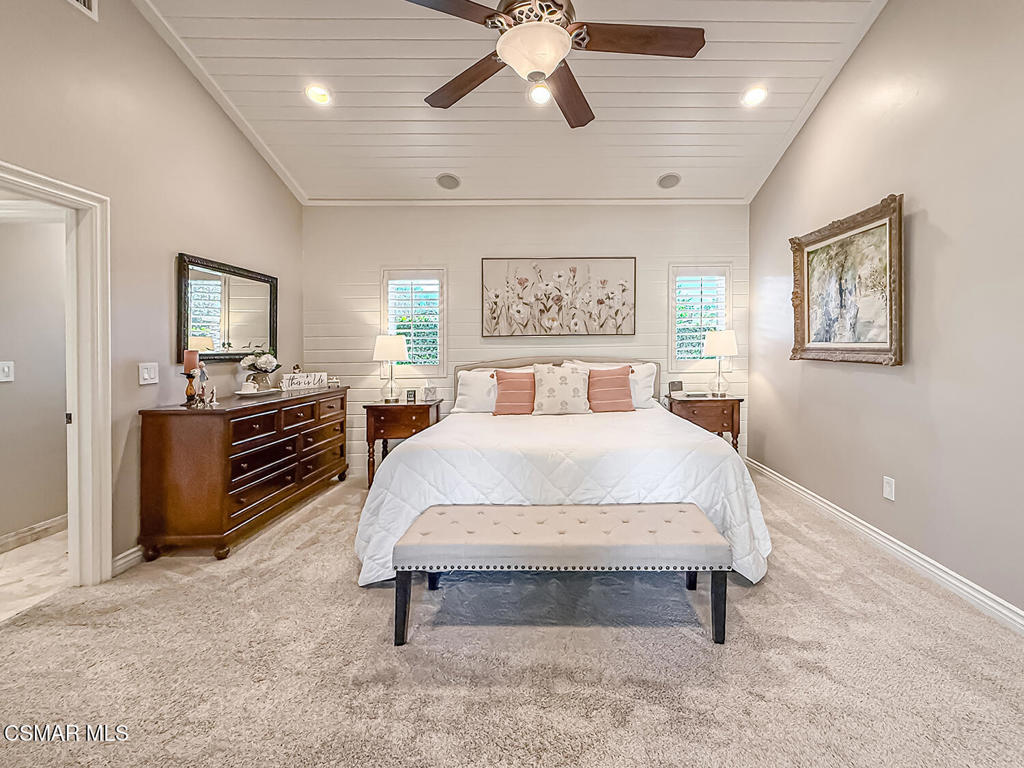 3116 Lori Circle Simi Valley, CA 93063 - Photo 40 of 74 a bedroom with a bed and a chandelier