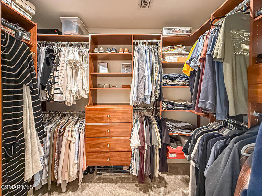 3116 Lori Circle Simi Valley, CA 93063 - Photo 47 of 74 a view of walk in closet with clothes and shoes