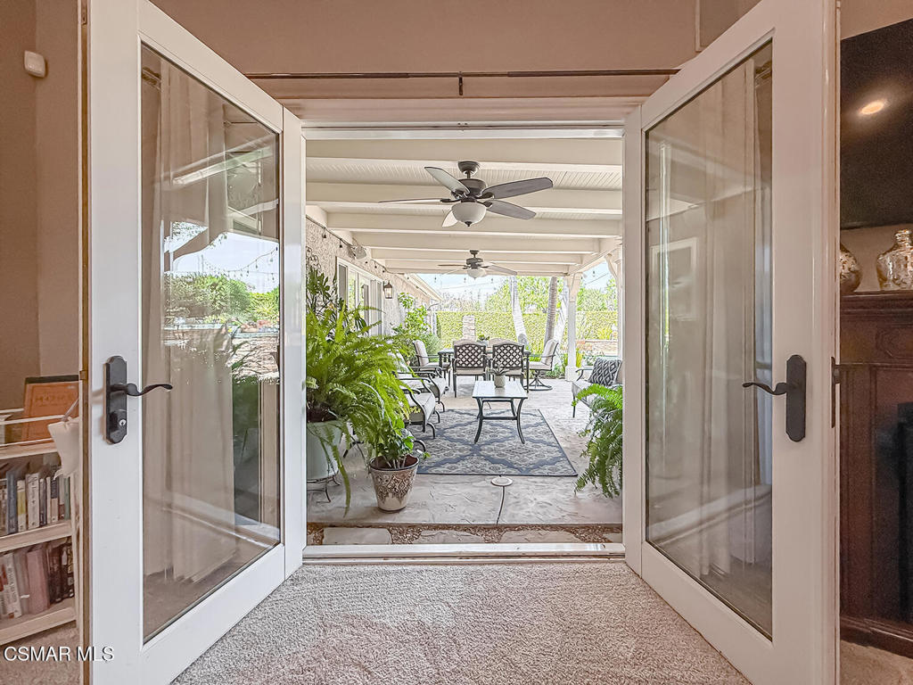 3116 Lori Circle Simi Valley, CA 93063 - Photo 49 of 74 a living room filled with furniture and a glass door