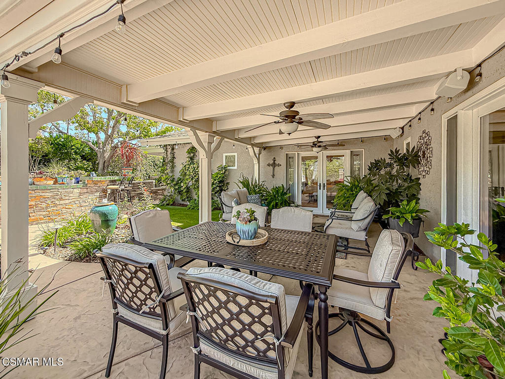 3116 Lori Circle Simi Valley, CA 93063 - Photo 50 of 74 a view of an outdoor dining space with a table and chairs