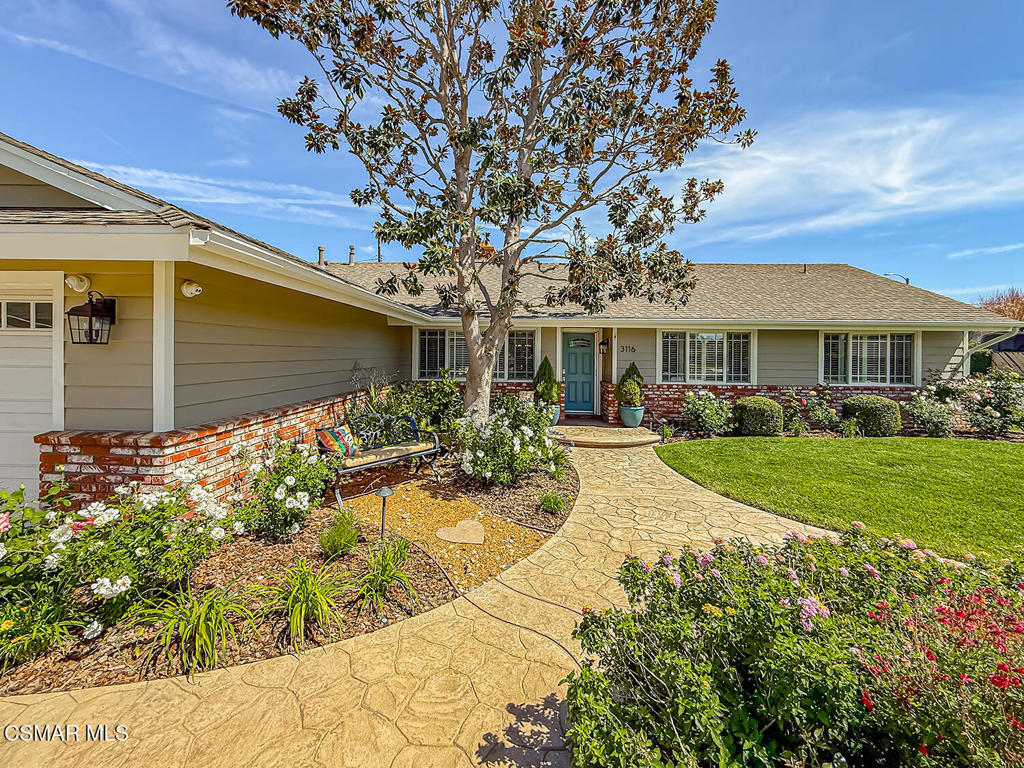 3116 Lori Circle Simi Valley, CA 93063 - Photo 5 of 74 a view of patio with table and chairs under an umbrella