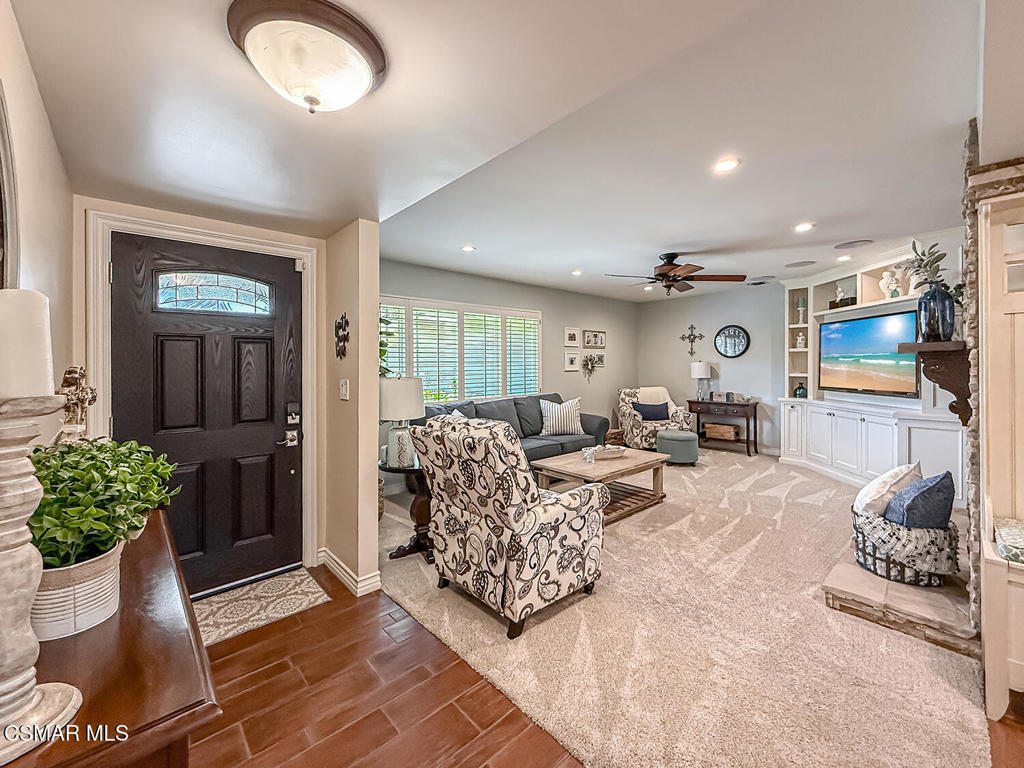 3116 Lori Circle Simi Valley, CA 93063 - Photo 8 of 74 a living room with furniture and a potted plant