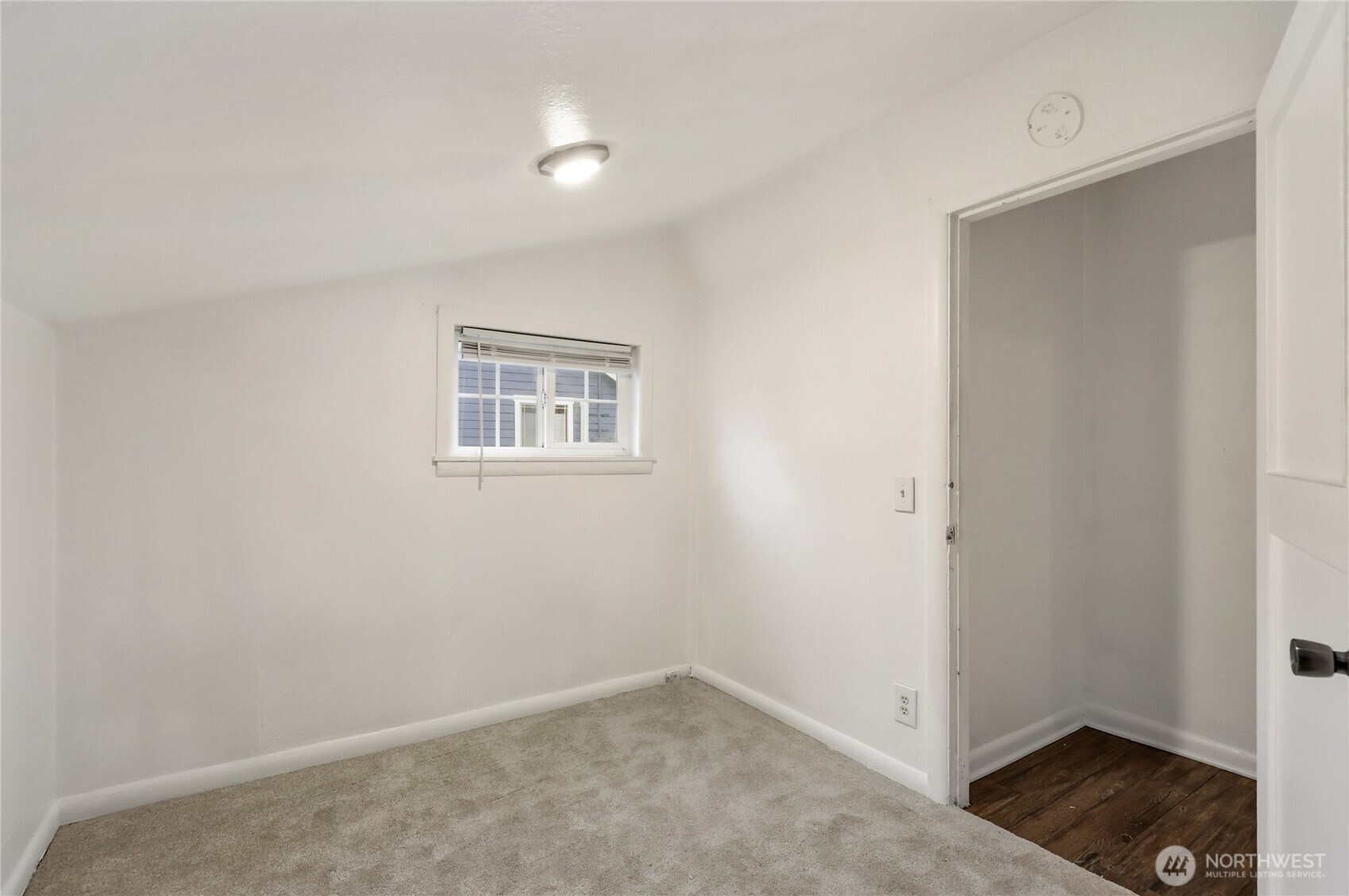 1505 Retsil Road Southeast Port Orchard, WA 98366 - Photo 13 of 19 an empty room with a door and a window