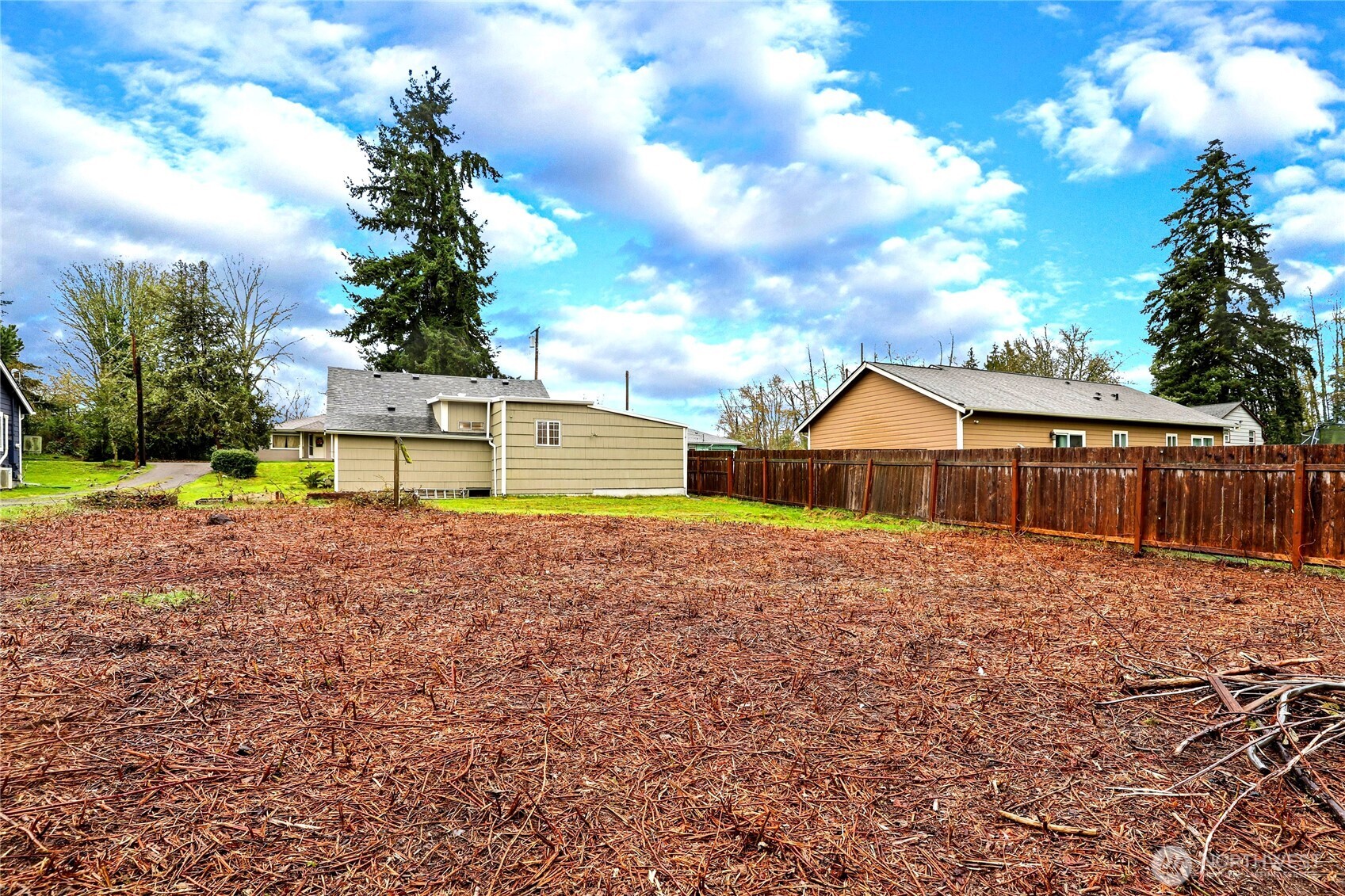 1505 Retsil Road Southeast Port Orchard, WA 98366 - Photo 17 of 19 a view of house with backyard and entertaining space