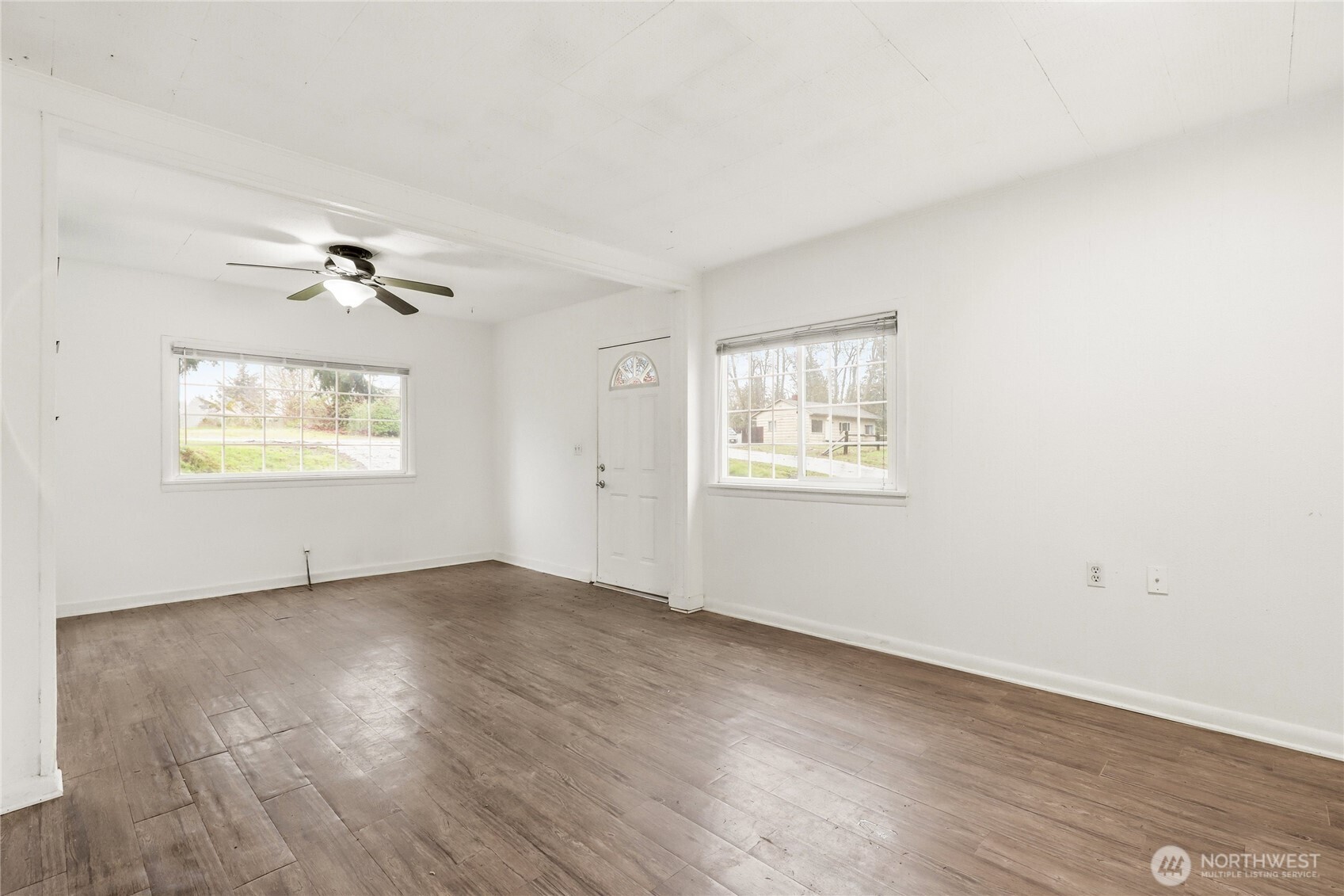 1505 Retsil Road Southeast Port Orchard, WA 98366 - Photo 3 of 19 a view of an empty room with a window