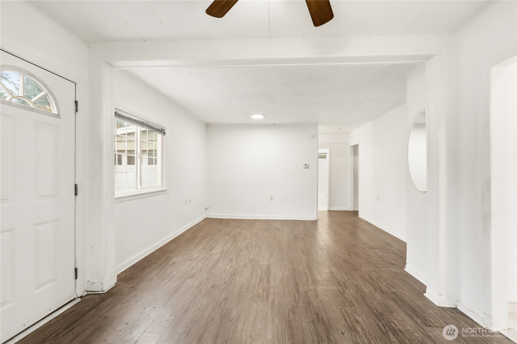 1505 Retsil Road Southeast Port Orchard, WA 98366 - Photo 5 of 19 a view of an empty room with wooden floor
