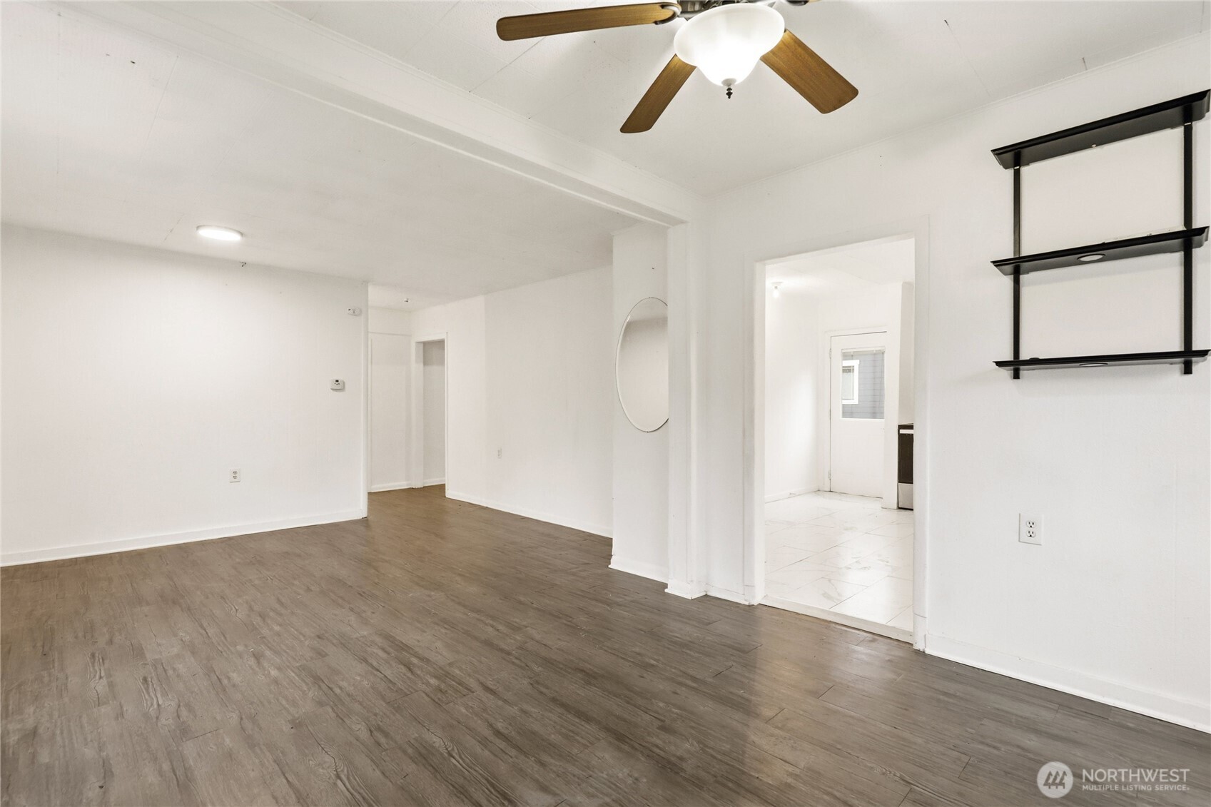 1505 Retsil Road Southeast Port Orchard, WA 98366 - Photo 6 of 19 a view of empty room with wooden floor